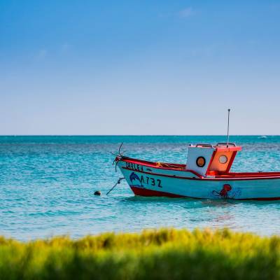 a small boat in a body of water