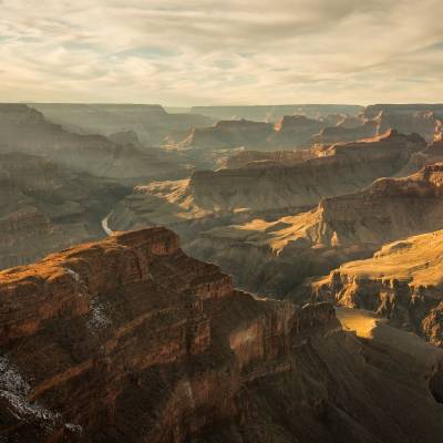 a canyon with a mountain in the background