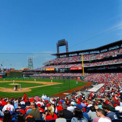 a group of people on a baseball field