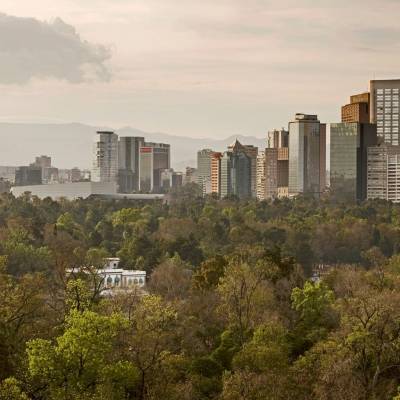 a view of a city with tall buildings in the background