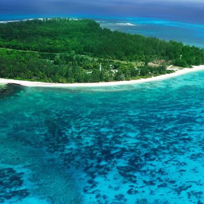 Aerial view of Denis Island Seychelles surrounded by blue sea waters