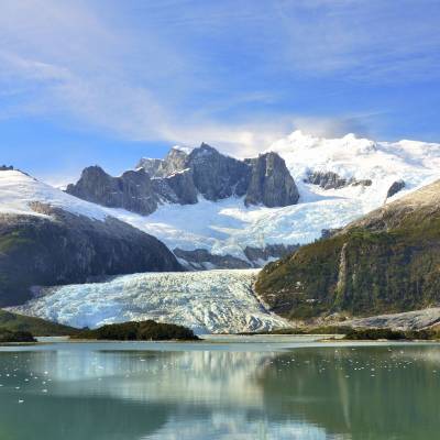 a lake with a mountain in the background