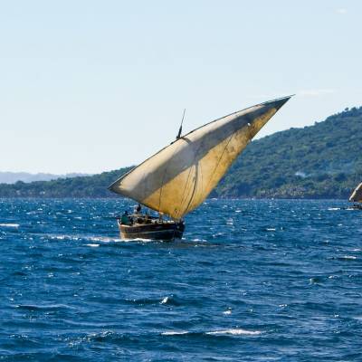 a small boat in a body of water