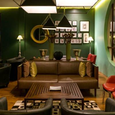 a living room with a leather chair