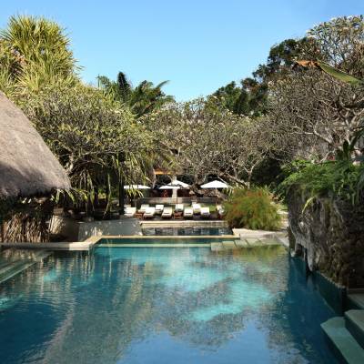 a pool next to a body of water