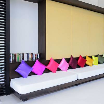 a room filled with furniture and a large window