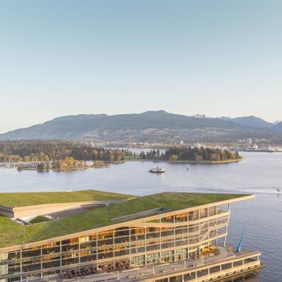 a boat is docked next to a body of water