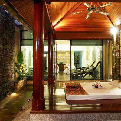 a room with a fireplace and a large window
