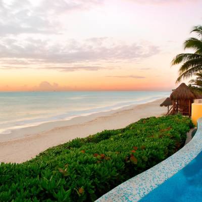 a beach next to a body of water