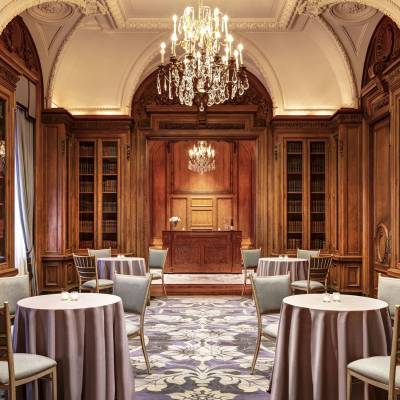 a dining room table in front of a window