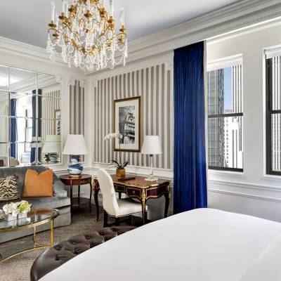 a living room filled with furniture and a large window