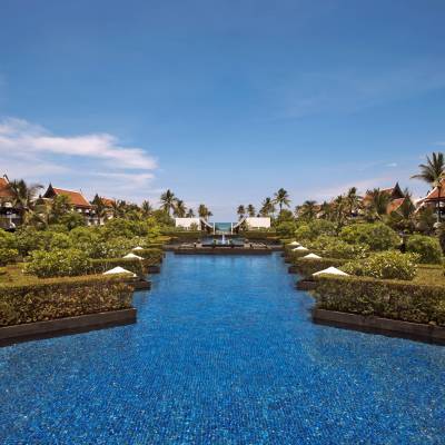 a pool next to a body of water