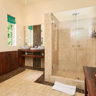 a room with a sink and a mirror