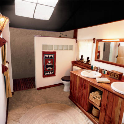 a room with a sink and a mirror