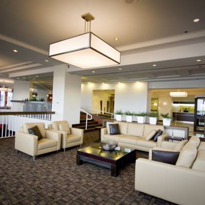a living room filled with furniture and a fireplace