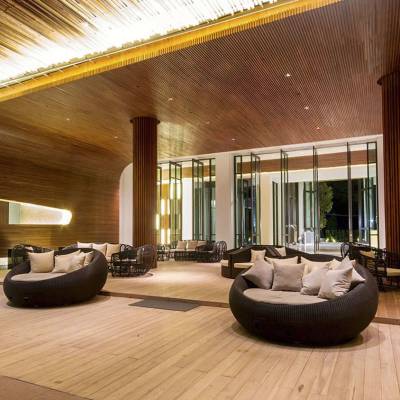a living room filled with furniture and a large window