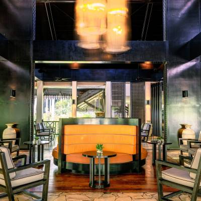 a living room filled with furniture and a fireplace