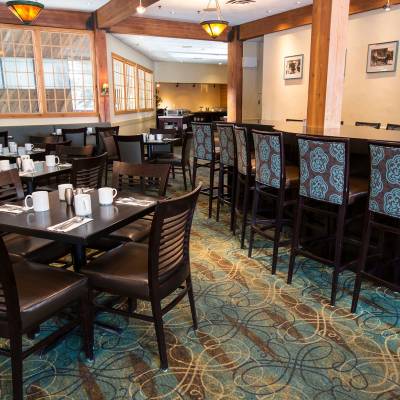 a room filled with furniture and a large window