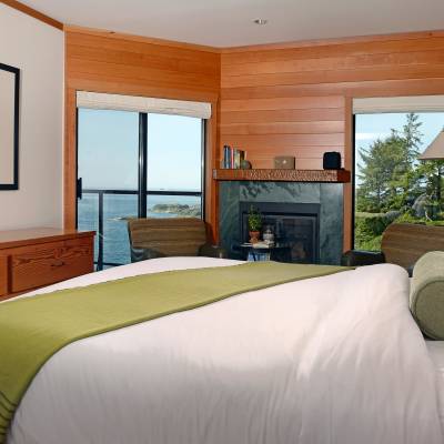 a bedroom with a bed in a room