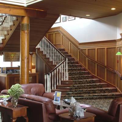 a living room filled with furniture and a large window