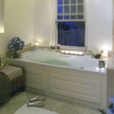 a bedroom with a large mirror