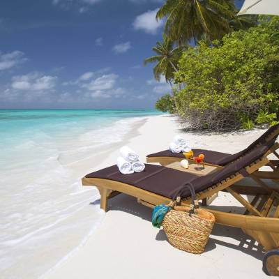 a boat sitting on top of a beach