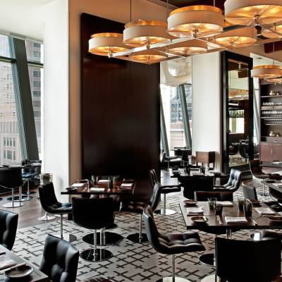 a room filled with furniture and a large window