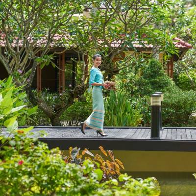 a person standing in a garden