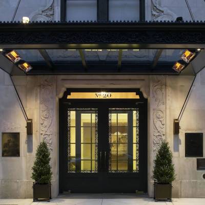a large brick building with a store window