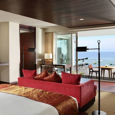 a bedroom with a large bed in a hotel room
