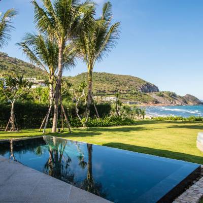 a pool next to a body of water