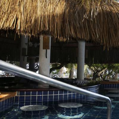 a pool next to a body of water