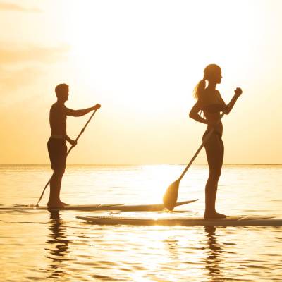 Couple paddleboarding