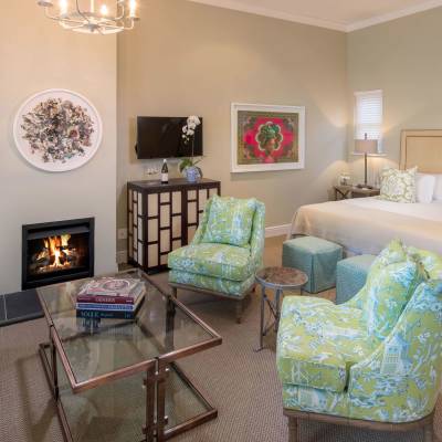 a living room filled with furniture and a tv