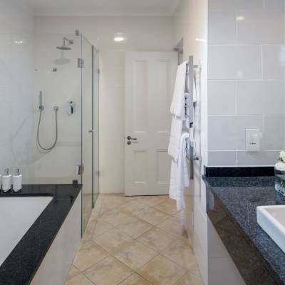 a room with a sink and a mirror