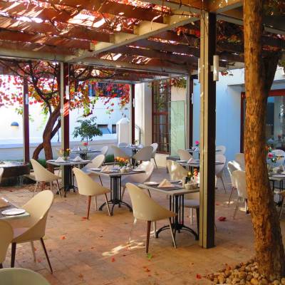a dining room table in front of a building