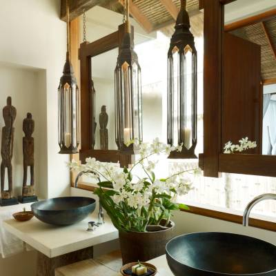 a vase of flowers on a kitchen counter