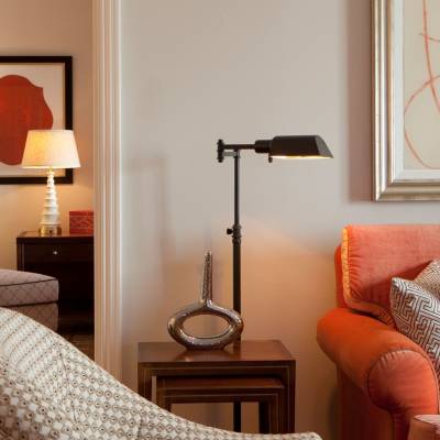 a living room with a couch and a chair