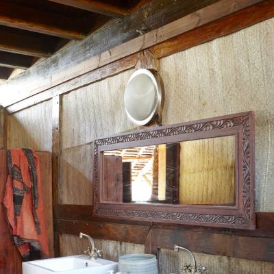a double sink and large mirror