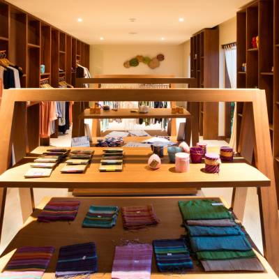 a room filled with furniture and a large window