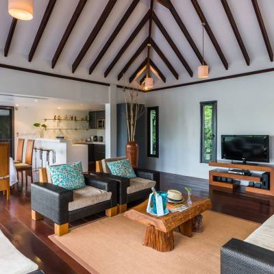 a living room filled with furniture and a fireplace