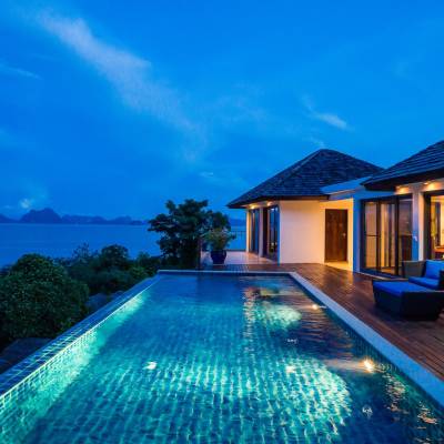 a pool next to a body of water