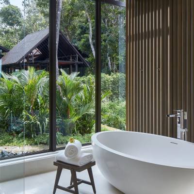 a room filled with furniture and a large window