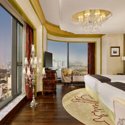 a living room filled with furniture and a large window