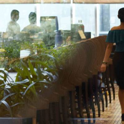 a person standing in front of a window