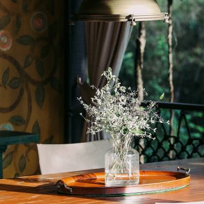 a vase of flowers on a table