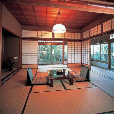 a room filled with furniture and a large window