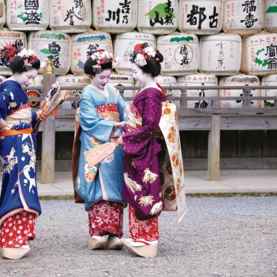 a group of people standing in front of a building