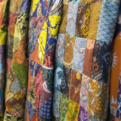 a group of different colored ties