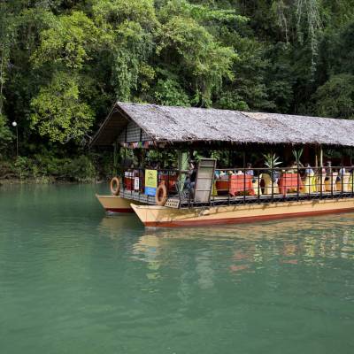 a small boat in a body of water